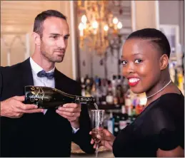  ?? Photo courtesy of Wine.co.za ?? Phumi Ngcobo gets served up some bubbly.