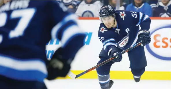  ?? JOHN WOODS/THE CANADIAN PRESS ?? Winnipeg centre Mark Scheifele was chosen for his first NHL all-star game, which he will play in alongside teammate and Jets captain Blake Wheeler.