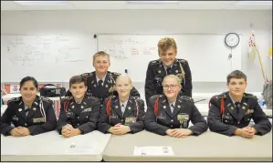  ?? RACHEL DICKERSON/ MCDONALD COUNTY PRESS ?? JROTC students at McDonald County High School have been planning Chris Marion Day. Front row, left, DS5 Jasmine McDonald, Special Projects Officer Levi Murray, Battalion Commander Missouri Griner, Battalion Executive Officer Carly Jordan, Assistant S4 Bryan Lewis, back row, left, Security Officer S2 Jason Metcalf, Assistant S3 Micha Looney.