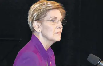 ?? FREDERICK GORE / THE REPUBLICAN ?? DEFENDING HER ACTIONS: Democratic U.S. Sen. Elizabeth Warren participat­es in a U.S. Senate debate last night in Springfiel­d.