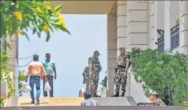  ??  ?? Security officials outside the residence of DMK leader MK Stalin's daughter in Chennai on Friday.