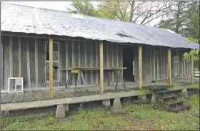  ?? File Photo/Arkansas Democrat-Gazette/BILL BOWDEN ?? Levon Helm’s boyhood home in Turkey Scratch has been moved 8 miles south to downtown Marvell, where it is being restored. Helm was a drummer and vocalist for The Band who won Grammy awards for two solo albums. He died in 2012.