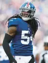  ?? DUSTIN SATLOFF/GETTY ?? The Giants’ Jaylon Smith celebrates after causing an incomplete pass during the second quarter of Sunday’s game against the Texans at Metlife Stadium in East Rutherford.