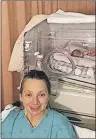  ?? TC MEDIA ?? Bobbie-Sue Cheeseman of Bangor Road, P.E.I., sits near her ninth child, Monica Grace, who arrived roughly eight weeks early at a hospital in Halifax on Wednesday. Mom and baby are doing well, but both will need to spend more time in hospital.