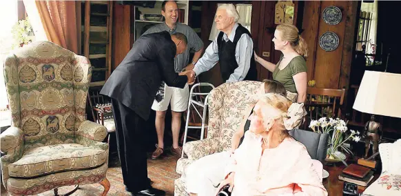  ?? CONTRIBUTE­D ?? The Reverend Huntley Brown (left) greets Billy Graham (centre) while Ruth Graham (right) and other members of the Graham family look on.