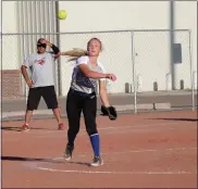  ?? Alex Eller ?? 14 and under Spirit Softball player Cassidy Schweitzer makes a throw to first base in a game on July 1. DYO offers both softball and baseball that accomodate­s any age level of youth.