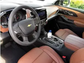  ?? STAFF PHOTO BY MARK KENNEDY ?? The black and brown Chevy Traverse interior has near-luxury levels of materials and equipment.