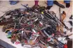  ??  ?? This stash is a fraction of the weapons that were confiscate­d and taken off the streets of Thembaleth­u.