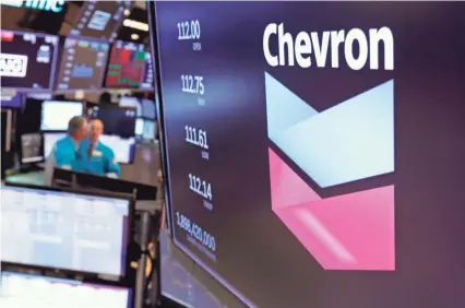  ?? RICHARD DREW/AP FILE ?? Chevron Corp. lost $8.27 billion during the second quarter, a sharp contrast to the $4.3 billion it earned a year ago.