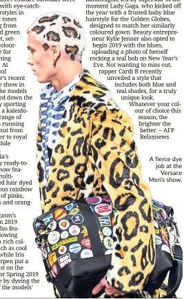  ??  ?? A fierce dye job at the Versace Men’s show.