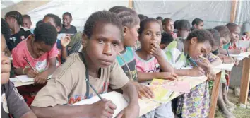  ?? — AFP ?? Children attending a class at a temporary shelter in Wamena, Indonesia’s Papua province.