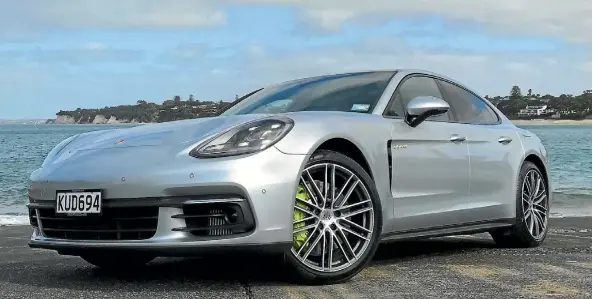  ??  ?? Porsche adds some mean into the green Panamera 4 E-Hybrid.