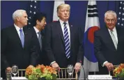  ?? EVAN VUCCI — ASSOCIATED PRESS ?? President Donald Trump, center, attends a luncheon with, from left, Vice President Mike Pence, Japanese Prime Minister Shinzo Abe, and Secretary of State Rex Tillerson. Trump announced sanctions aimed at North Korea.