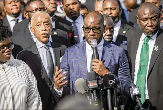  ?? STEPHEN B. MORTON/ASSOCIATED PRESS ?? Pastor Jamal Bryant speaks to a crowd of nearly 750 pastors, supporters and family of Ahmaud Arbery during a Wall of Prayer event outside the Glynn County Courthouse on Thursday in Brunswick. Defense attorney Kevin Gough has complained in court about Black pastors attending.