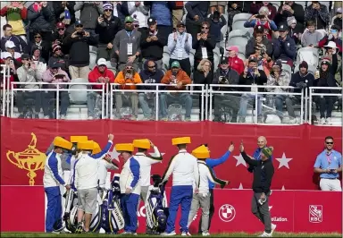  ?? JEFF ROBERSON — THE ASSOCIATED PRESS ?? Team Europe wears cheesehead­s on the first tee during a practice day at the Ryder Cup at the Whistling Straits Golf Course Wednesday, Sept. 22, 2021, in Sheboygan, Wis.