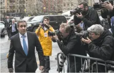  ?? Jeenah Moon / New York Times ?? Michael Cohen, President Trump’s lawyer, arrives at the federal courthouse in New York City on Monday for a hearing.