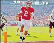  ?? Kevin C. Cox Getty Images ?? ALABAMA transfer Jalen Hurts could be the third straight Oklahoma quarterbac­k to win the Heisman.