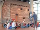  ?? LIZ DUFOUR/USA TODAY NETWORK ?? At the National Undergroun­d Railroad Freedom Center in Cincinnati in 2011, students learn about a slave pen moved from Mason County, Ky.