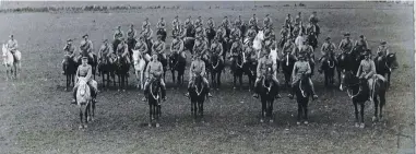  ?? ?? The 37-strong Tākaka Mounted Rifles, assembled on their horses in front of the Tākaka Grandstand just before riding off to war, would have been a moving sight to friends and families waving tearful goodbyes.