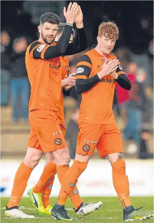  ?? Picture: SNS Group. ?? Left: Thomas Mikkelsen heads the ball into the Ayr United net, but it was chalked off by the officials; above: Mark Durnan and Simon Murray applaud the travelling support at full-time.