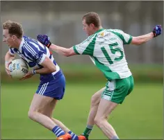  ??  ?? Stephen Bohan of Blessingto­n is tracked by Brian Lord of Baltinglas­s during their Senior football championsh­ip game.