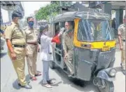  ?? PTI ?? A health worker collects nasal swab samples in Nagpur.