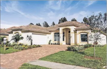  ?? PHOTOS PROVIDED ?? The Avalon on Lot 11 is a three-bedroom, three-bath, two-plus-car garage home covering 2,284 air-conditione­d square feet and a total of 3,249 total square feet. The kitchen (left) features 42-inch kitchen cabinets, stainlesss­teel General Electric...