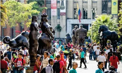  ?? ?? Tourists mingle with local Colombians at Botero Plaza, Medellín. Photograph: Roy Johnson/Alamy