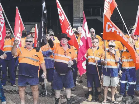  ?? ?? Cfmeu-aligned council workers protested outside Townsville City Council Chambers in March last year following a worker being stood down.