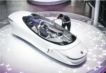  ?? — BLOOMBERG FILES ?? This Beijing Lingyun Zhineng Technology Co. concept electric two-wheel vehicle, unveiled at the Beijing, China auto show in April, could be a future import to North American markets.