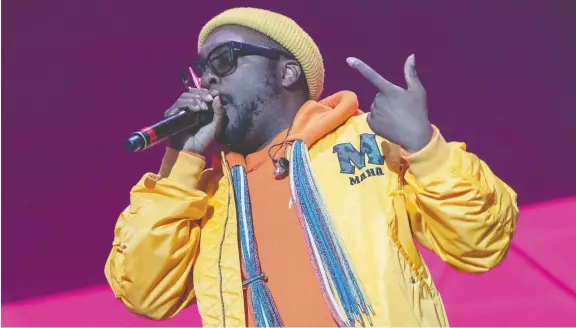  ?? SUZANNE CORDEIRO/AFP/GETTY IMAGES ?? Will.i.am of the Black Eyed Peas isn’t just a rapper. According to the World Economic Forum, he’s a“creative innovator, futurist and entertaine­r.”