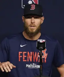  ?? AP ?? ON THE MIC: Chris Sale responds to questions during a news conference prior to Thursday’s workout.