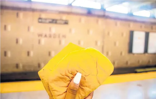  ?? ALICIA REID ?? Alicia Reid’s photo of a beloved beef patty from Fahmee Bakery at Warden subway station claimed top spot in the “things” category of the New View photo contest.