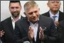  ?? (AP/Darko Bandic) ?? Chairman of Smer-Social Democracy party Robert Fico (center) addresses the results of an early parliament­ary election on Sunday during a news conference in Bratislava, Slovakia.