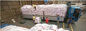  ??  ?? THE NFA RICE that came from Vietnam and Thailand are stored at NFA warehouse in Quezon City.