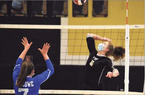  ?? Pete Paguaga / Hearst Connecticu­t Media ?? Trumbull’s Bailey Cenatiempo spikes the ball against Fairfield Ludlowe on Tuesday at Trumbull High School.