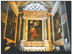  ??  ?? Visitors admire a cycle of paintings by 16th century artist Michelange­lo Merisi, known as Caravaggio, on the life of St. Matthew inside the Contarelli chapel of San Luigi dei Francesi Church in Rome.