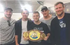 ?? Picture: Instagram ?? Matt Gillett, Michael Morgan, Coen Hess and Gavin Cooper pose with winning boxer Jeff Horn (centre).