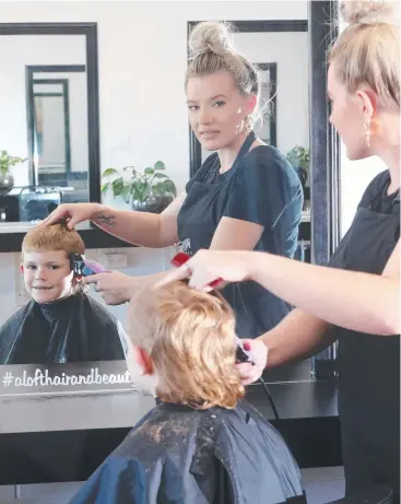  ?? Picture: STEWART McLEAN ?? IN STYLE: Brax Way, 8, from Little Mulgrave, has his mullet trimmed up at Aloft Hair and Beauty by Jamaica Bisset-O'Shea. Inset: Brother Blake also sports the hairstyle.