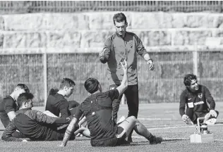  ?? Photos by Jerry Lara / Staff photograph­er ?? San Antonio FC coach Alen Marcina had some new players to greet this year as SAFC has six newcomers, including five who have played in the MLS or signed an MLS contract.