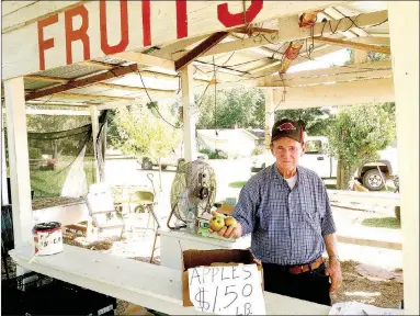  ?? COURTESY PHOTO ?? Billy Ray Dean of Alma operated an apple stand on the side of the road for many years.