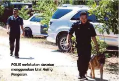  ??  ?? POLIS melakukan siasatan menggunaka­n Unit Anjing Pengesan.