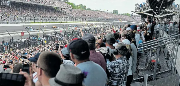  ?? Picture: GETTY IMAGES ?? SHOW GOES ON: At least one US sporting event plans to host a mammoth crowd despite the warnings of public health experts: the reschedule­d Indianapol­is 500 IndyCar Race on August 23. Organisers of the iconic race at Indianapol­is Motor Speedway have said they plan to operate at 50% fan capacity -- meaning a potential crowd of around 175,000 for the event. Pictured above are the crowds attending a May 2017 event.