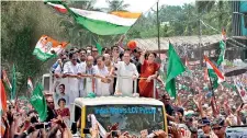  ?? ?? Rahul Gandhi, President of India's Congress party, and his sister Priyanka Gandhi Vadra, wave to supporters. (Reuters)