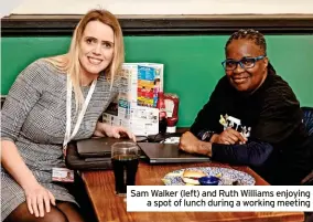  ?? ?? Sam Walker (left) and Ruth Williams enjoying a spot of lunch during a working meeting