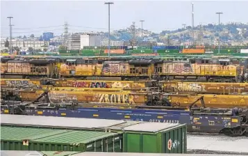  ?? DAMIAN DOVARGANES AP ?? The Union Pacific LATC Intermodal Terminal is seen on Tuesday in Los Angeles. California's Air Resources Board on Thursday approved a rule to cut emissions from diesel-powered locomotive­s.