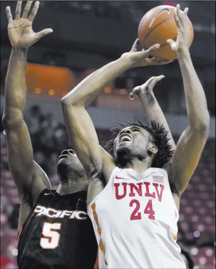  ?? Benjamin Hager Las Vegas Review-Journal ?? UNLV freshman forward Joel Ntambwe is averaging 12.4 points and 6.0 rebounds per game while shooting a team-high 39.2 percent (20 of 51) from 3-point range.