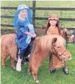  ??  ?? Leila Ashworth, six, and Max Cropper, seven, with Max’s family pony Belle who played the role of the donkey in St Peter’s RC Primary School’s nativity