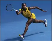  ?? ANDY WONG — THE ASSOCIATED PRESS ?? Coco Gauff plays a forehand return to Caroline Dolehide during their second round match at the Australian Open.