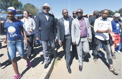  ?? Picture: Nigel Sibanda ?? SAYING NO TO OPPRESSION. Democratic Alliance leader Mmusi Maimane, centre, commemorat­es Human Rights Day in Sharpevill­e, Johannesbu­rg, yesterday. On March 21, 1960, police opened fire on a crowd in Sharpevill­e protesting against the pass laws....